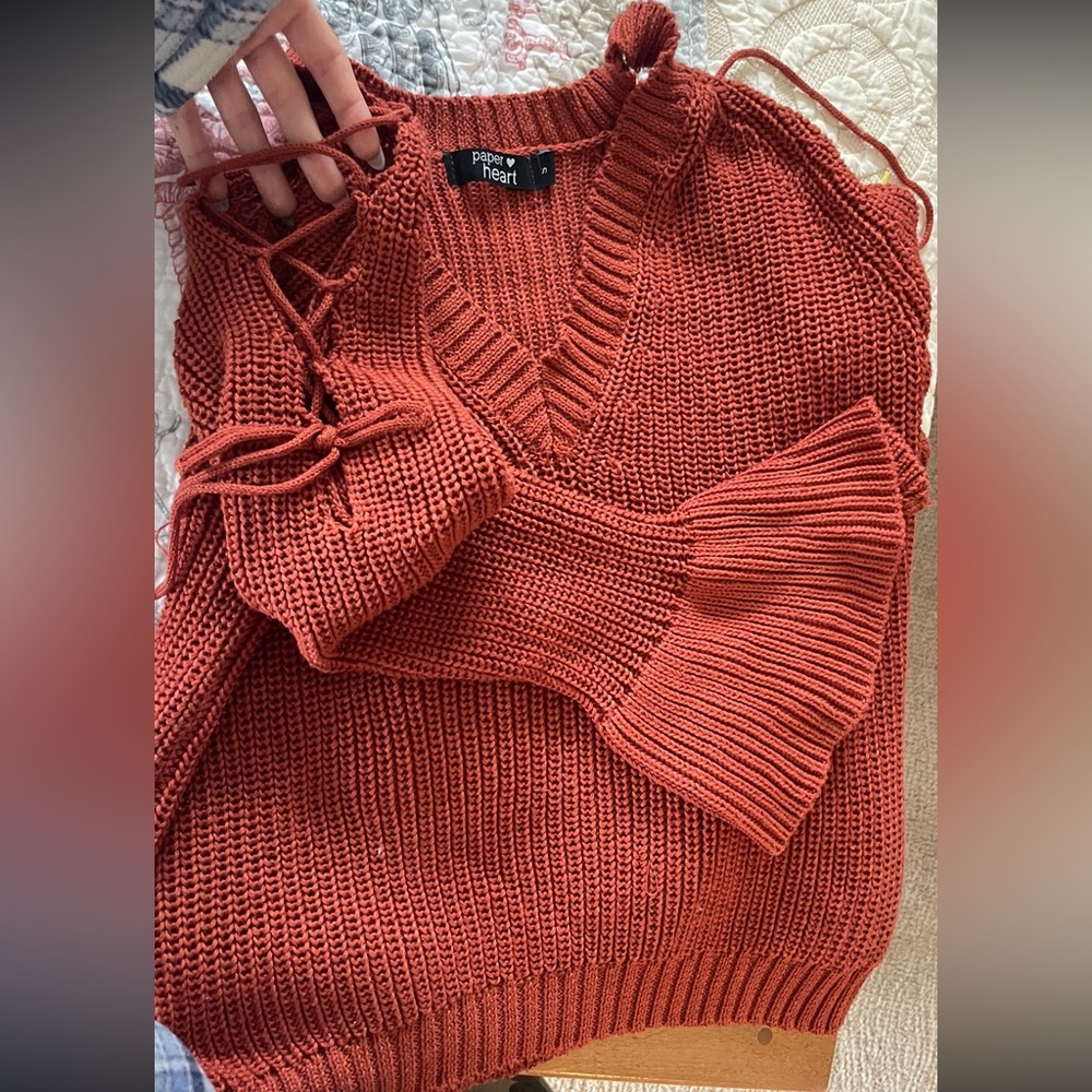 Open shoulder crisscross sweater